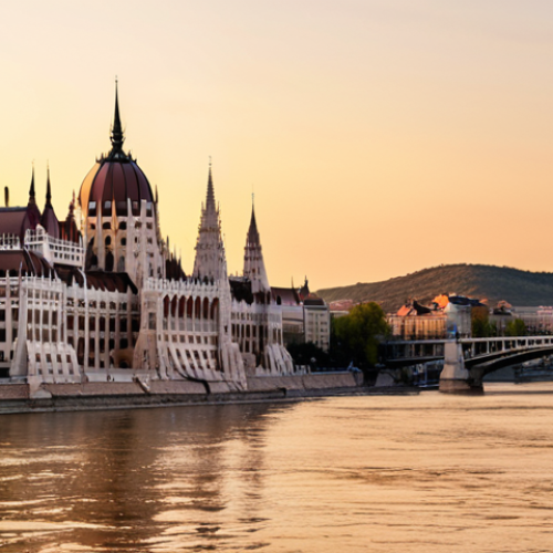 Home 19 **Prompt:** Picturesque view of the Danube River in Budapest, Hungary, with the Hungarian Parliament Building in the background. Golden hour lighting. Elegant apartment building with balconies overlooking the water. Focus on luxury and lifestyle appeal.